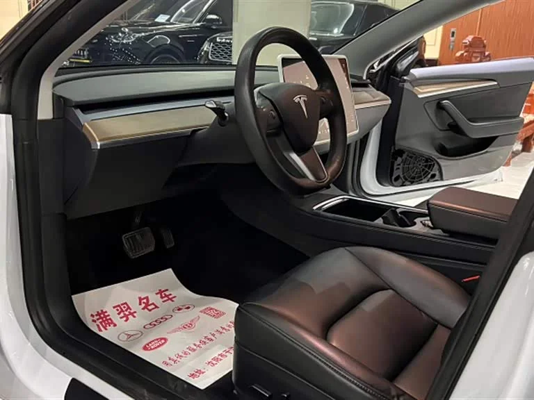 Tesla Model 3 — фото 10