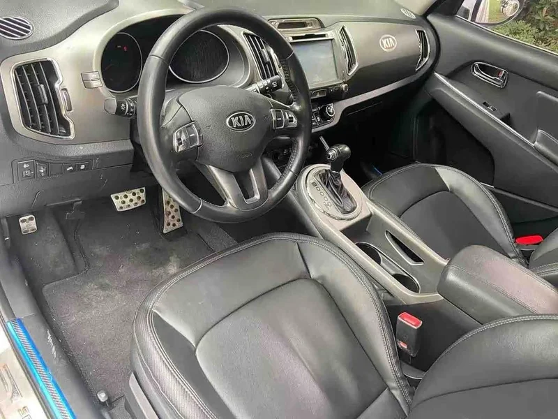 Kia Sportage — фото 5