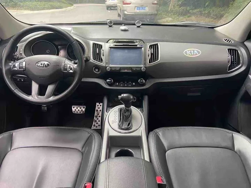 Kia Sportage — фото 6