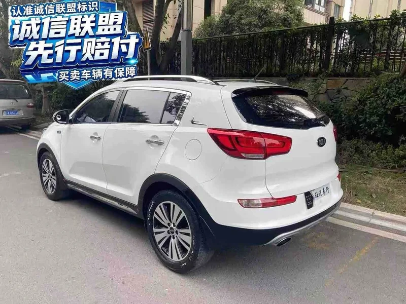 Kia Sportage — фото 9