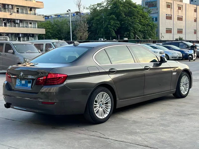 BMW 5-Series — фото 15
