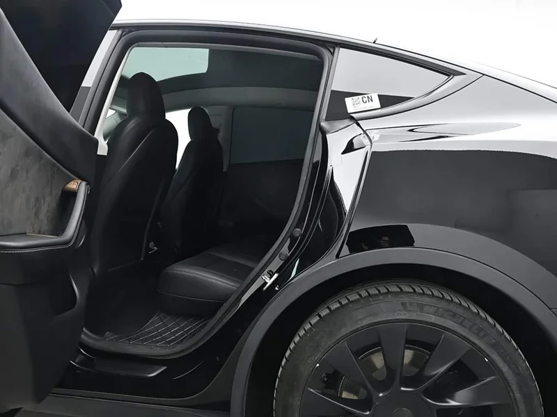 Tesla Model Y — фото 14