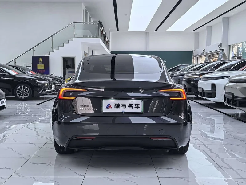 Tesla Model 3 — фото 14
