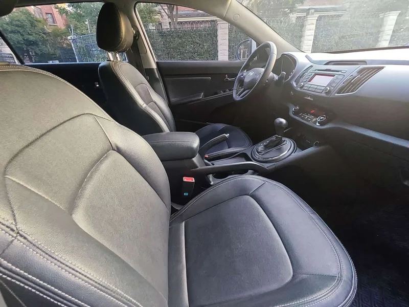 Kia Sportage — фото 12