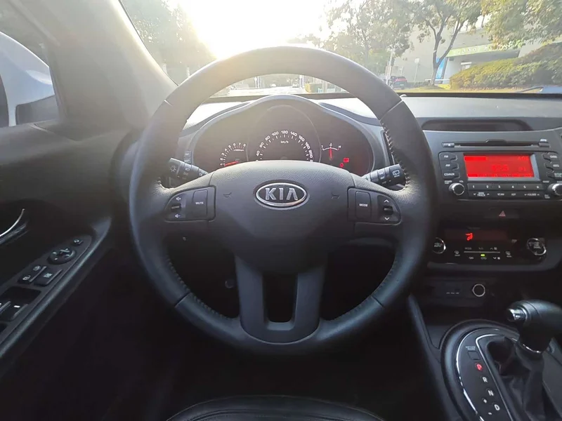 Kia Sportage — фото 14
