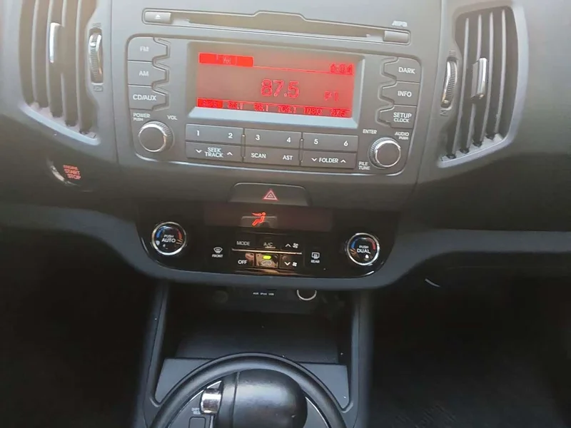 Kia Sportage — фото 15