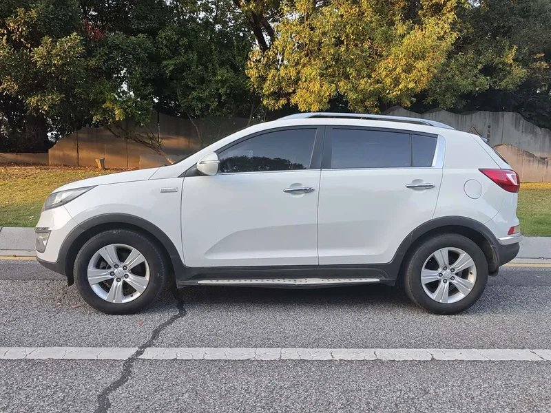 Kia Sportage — фото 5