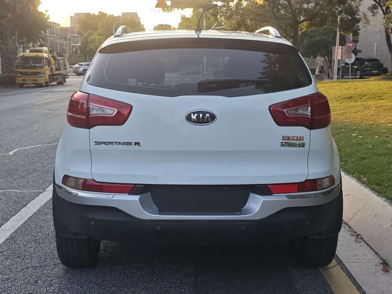 Kia Sportage — фото 7