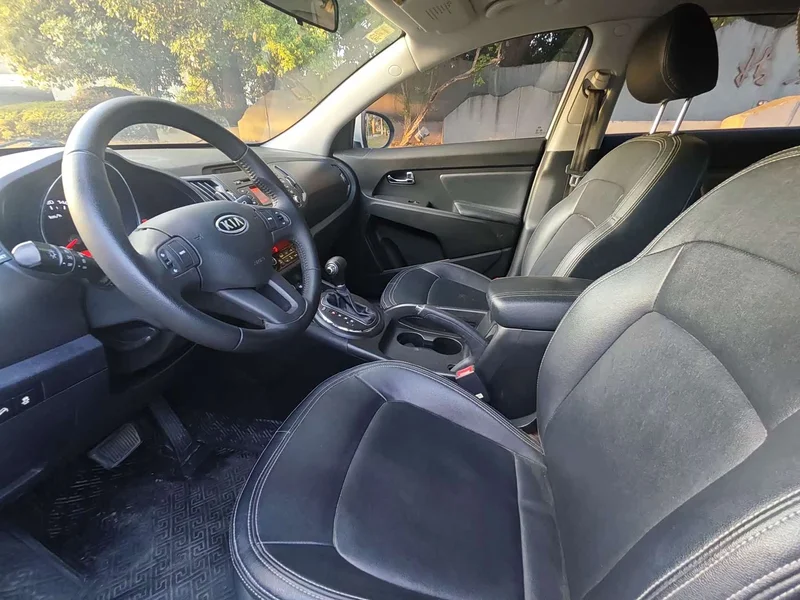Kia Sportage — фото 9