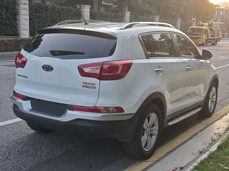 Kia Sportage — фото 10