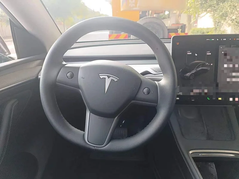 Tesla Model Y — фото 11