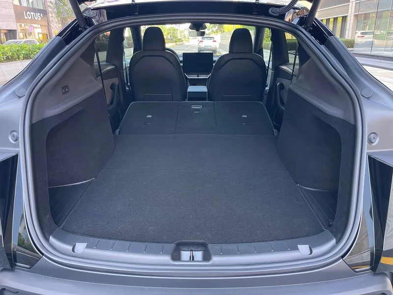 Tesla Model Y — фото 18