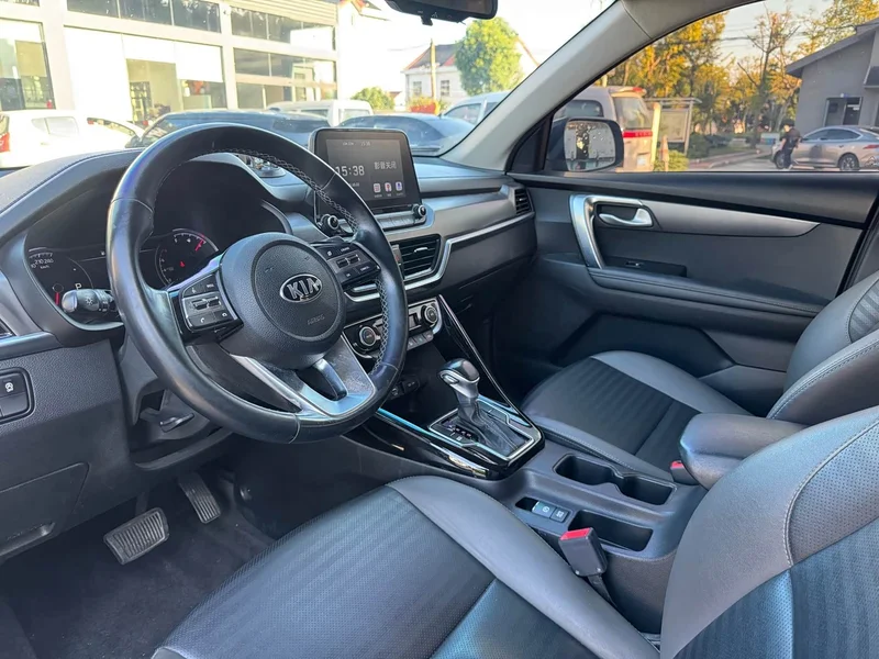 Kia Sportage — фото 11