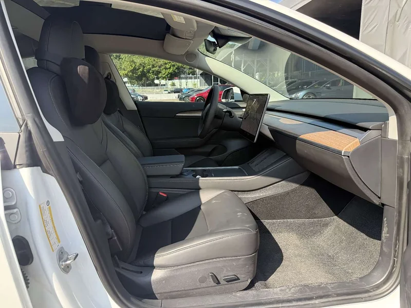 Tesla Model 3 — фото 12