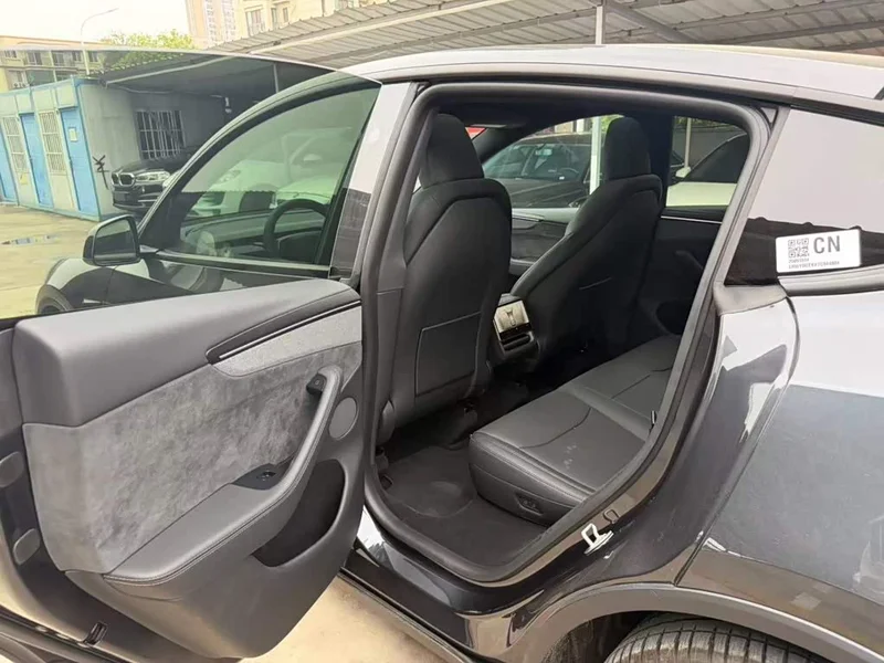 Tesla Model Y — фото 12