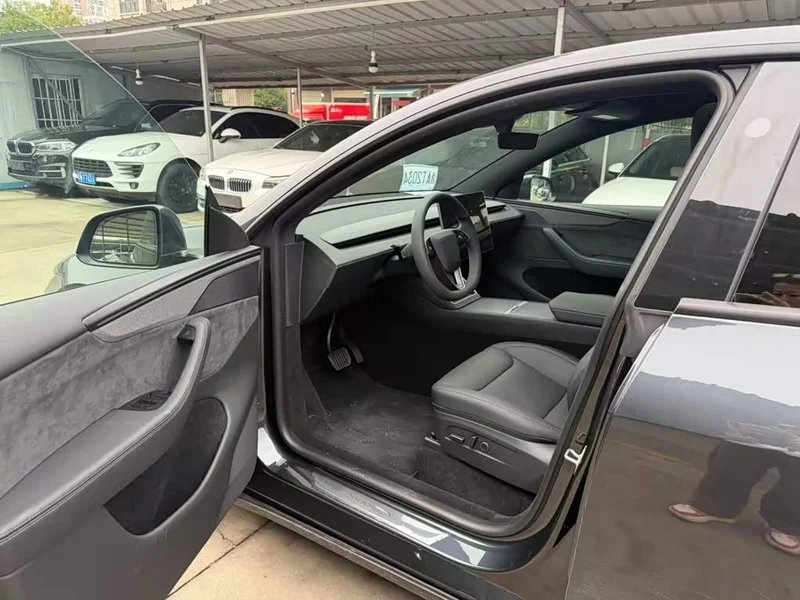 Tesla Model Y — фото 27