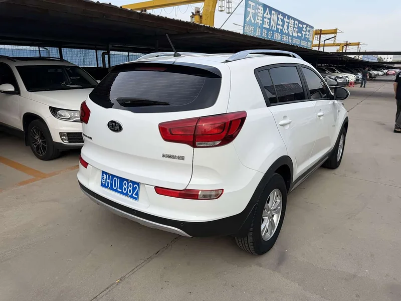 Kia Sportage — фото 7