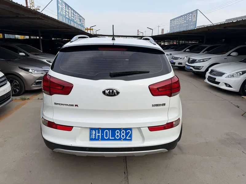 Kia Sportage — фото 8