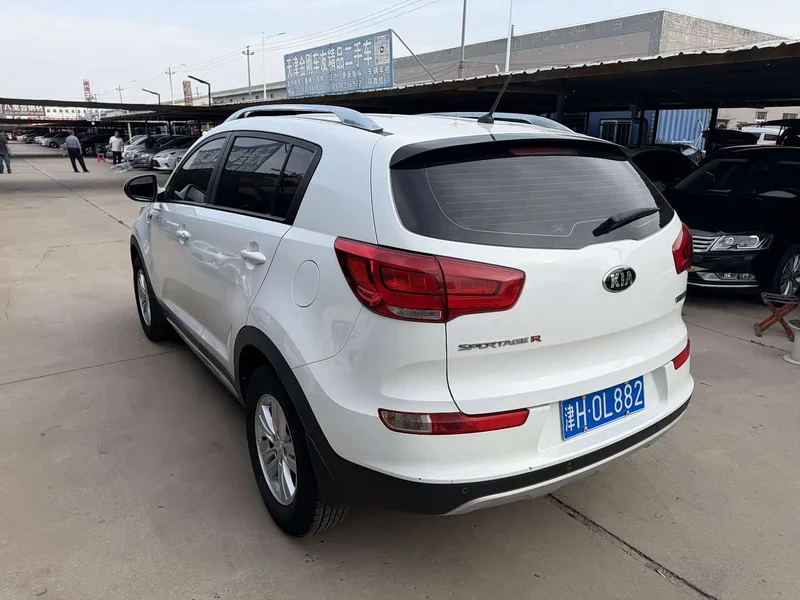 Kia Sportage — фото 9