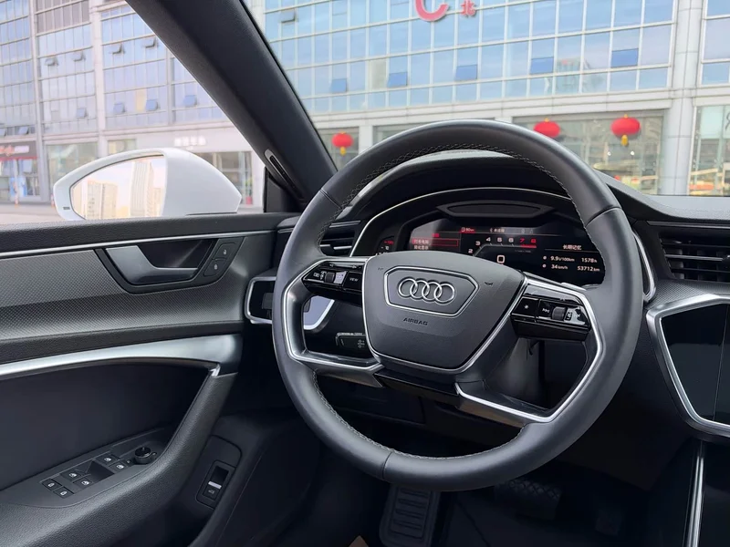 Audi A7L — фото 8