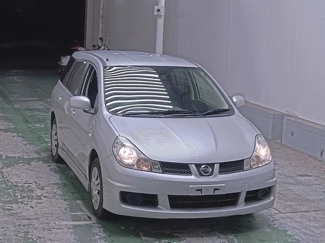 Nissan WINGROAD — фото 1