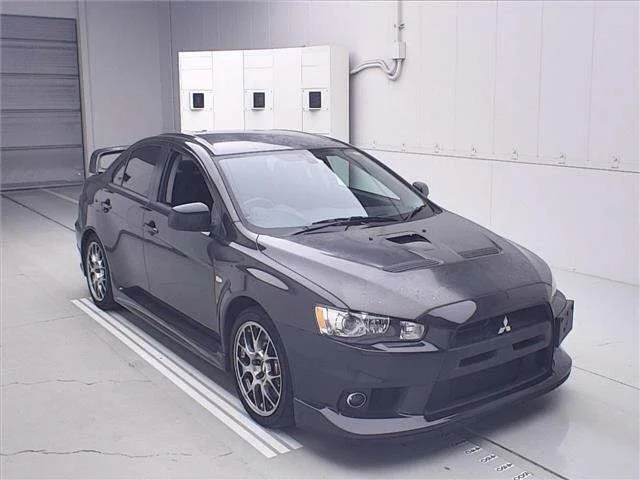 Mitsubishi Lancer — фото 1