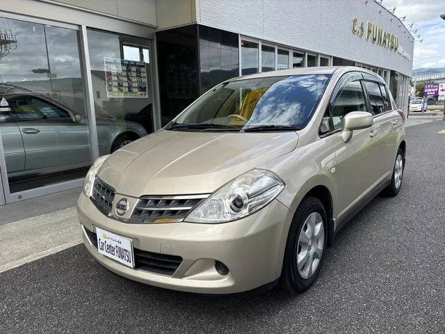 Nissan TIIDA — фото 1