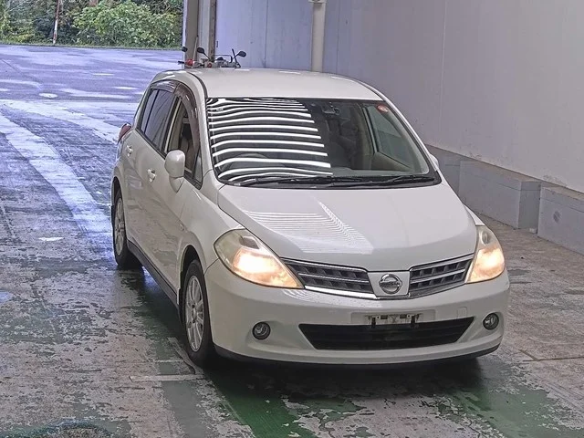 Nissan TIIDA — фото 1