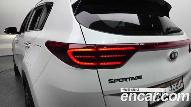 Kia Sportage — фото 23