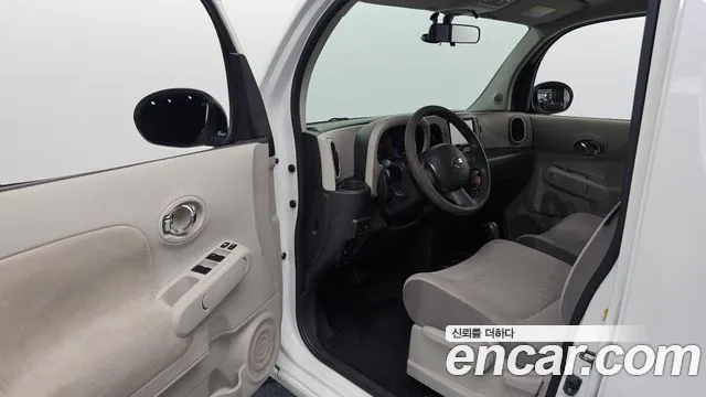 Nissan Cube — фото 10