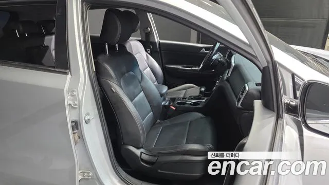 Kia Sportage — фото 11