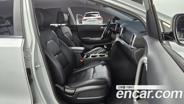 Kia Sportage — фото 11