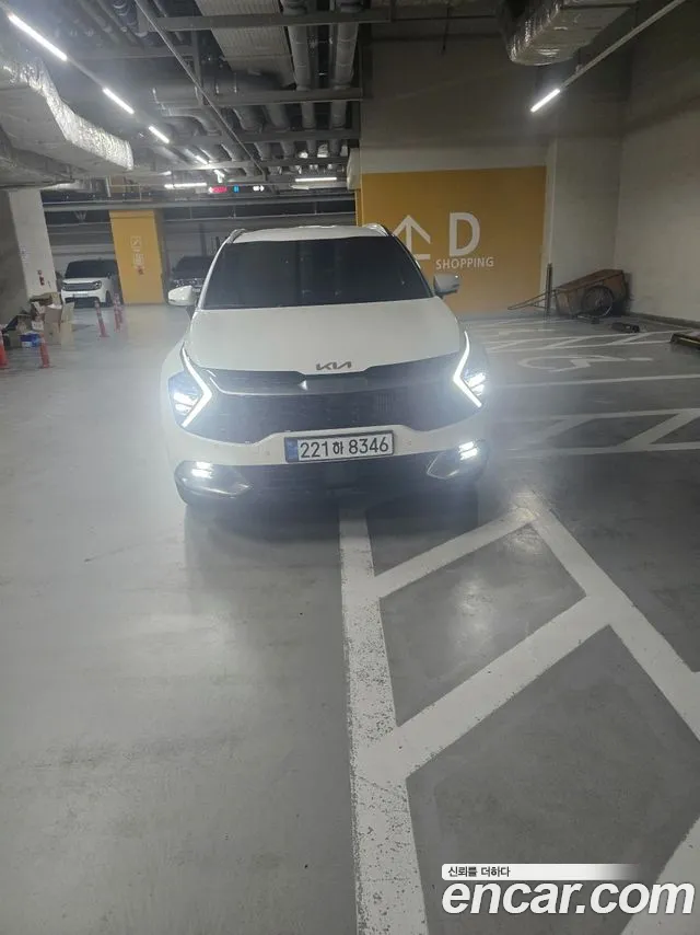 Kia Sportage — фото 1