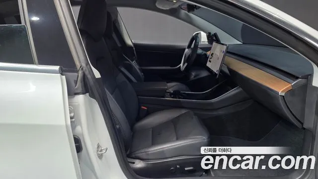Tesla Model 3 — фото 11