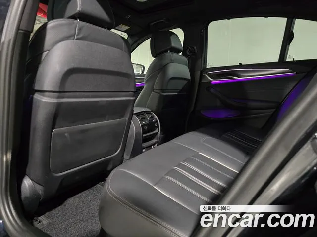 BMW 5-Series — фото 10