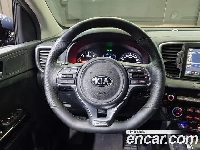 Kia Sportage — фото 13