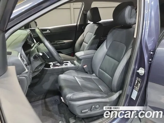 Kia Sportage — фото 17
