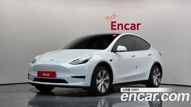 Tesla Model Y — фото 1