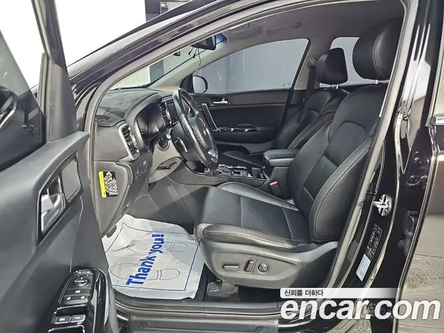 Kia Sportage — фото 11