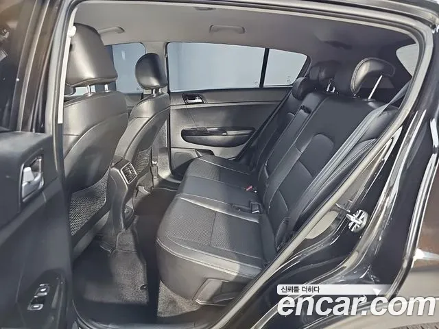Kia Sportage — фото 12
