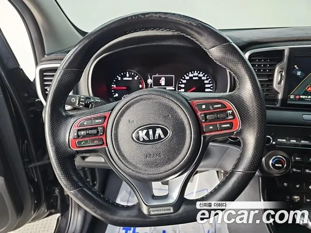 Kia Sportage — фото 9