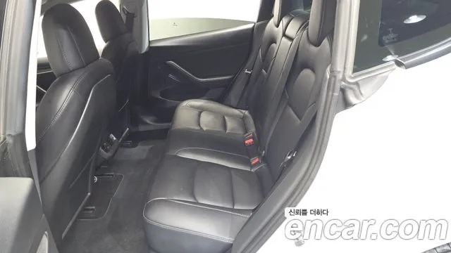 Tesla Model 3 — фото 11