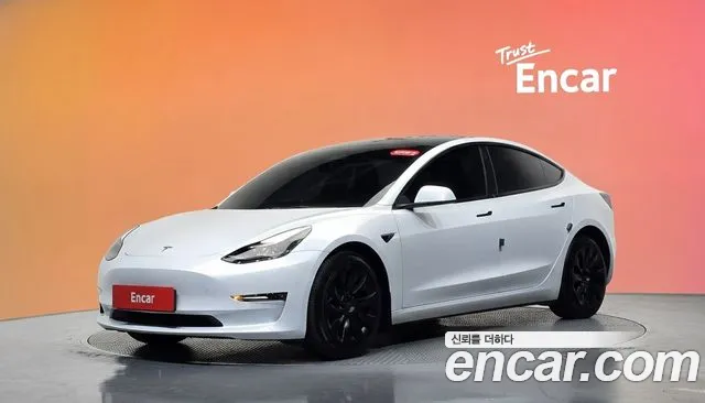 Tesla Model 3 — фото 21
