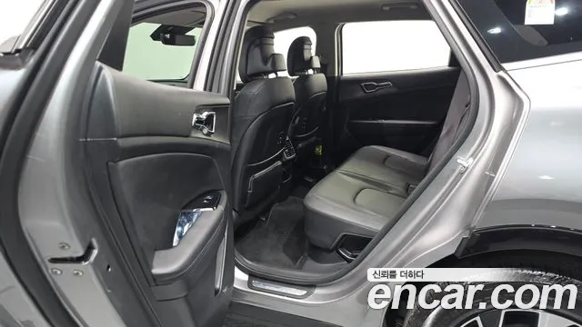 Kia Sportage — фото 11