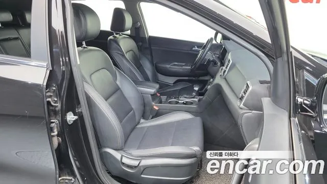 Kia Sportage — фото 11