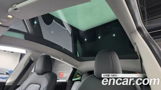 Tesla Model Y — фото 17