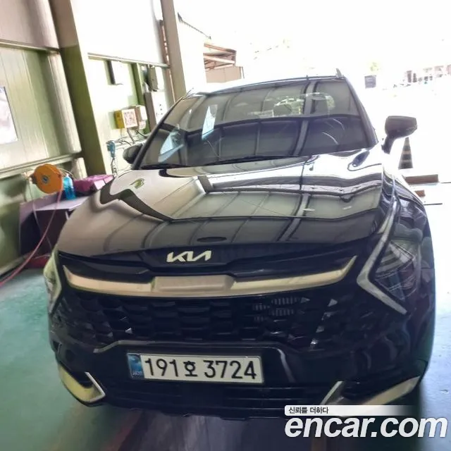 Kia Sportage — фото 1