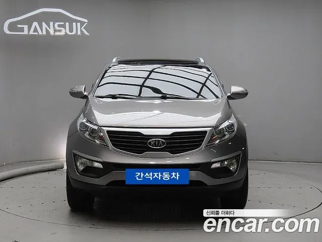 Kia Sportage — фото 1