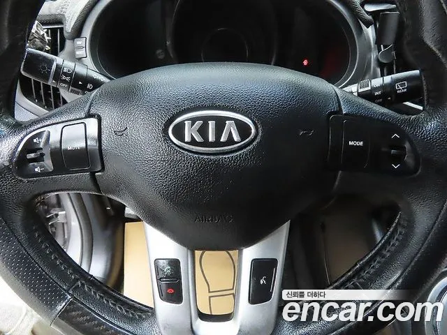 Kia Sportage — фото 9