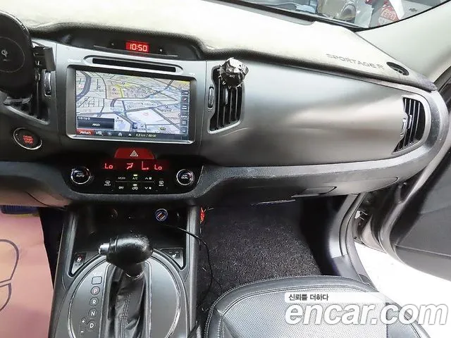 Kia Sportage — фото 10